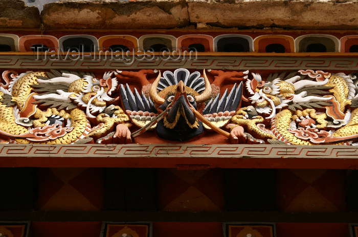 bhutan15: Bhutan - garuda and serpents - detail of wood carvings above a gate - Trongsa Dzong - photo by A.Ferrari - (c) Travel-Images.com - Stock Photography agency - Image Bank