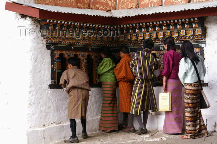 bhutan239: Bhutan - Bhutanese people rolling prayer wheels, in Chari Goemba - photo by A.Ferrari - (c) Travel-Images.com - Stock Photography agency - Image Bank