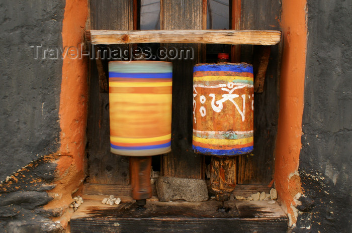 bhutan326: Bhutan - Jampa Lhakhang - Bumthang valley - two prayer wheels, one spinning - photo by A.Ferrari - (c) Travel-Images.com - Stock Photography agency - Image Bank