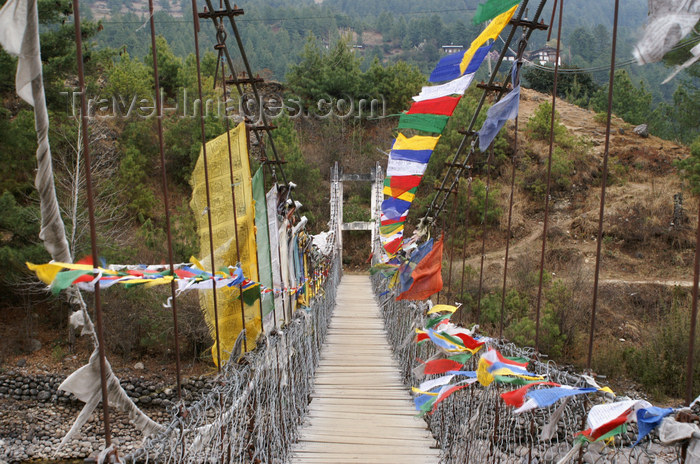 bhutan342: Bhutan - Kurjey Lhakhang - suspension bridge with prayer flags - photo by A.Ferrari - (c) Travel-Images.com - Stock Photography agency - Image Bank