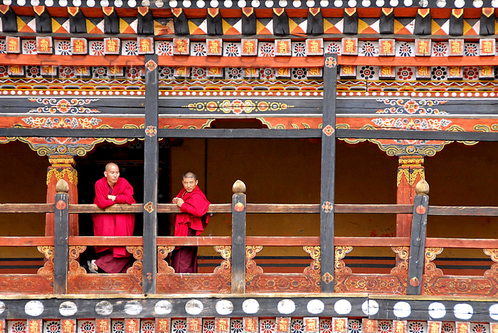 bhutan410: Bhutan, Paro, Monks on balcony of inner courtyard of Paro Dzong - photo by J.Pemberton - (c) Travel-Images.com - Stock Photography agency - Image Bank