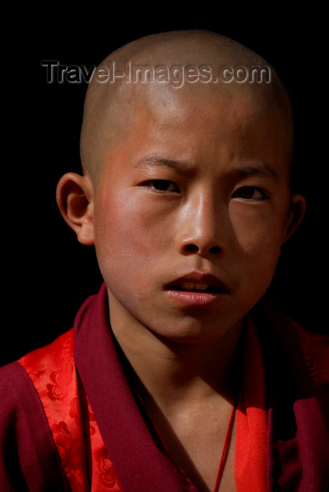 bhutan416: Bhutan, Paro,Young monk in Paro Dzong - photo by J.Pemberton - (c) Travel-Images.com - Stock Photography agency - Image Bank