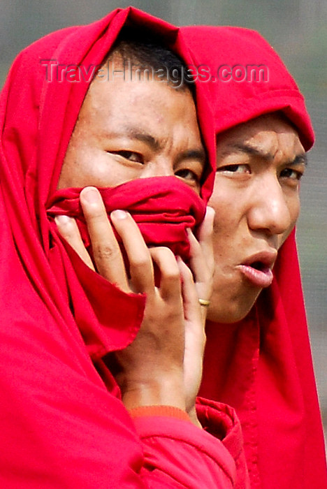 bhutan422: Bhutan, Thimphu, Monks watching archery contest - photo by J.Pemberton - (c) Travel-Images.com - Stock Photography agency - Image Bank