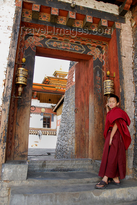 bhutan432: Bhutan, Thimpu, Young Monk by entrance to Dzong - photo by J.Pemberton - (c) Travel-Images.com - Stock Photography agency - Image Bank