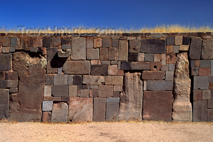 bolivia41: Tiwanaku / Tiahuanacu, Ingavi Province, La Paz Department, Bolivia: magnetized stones at the Akapana Temple - sandstone pillars and ashlars of andesite masonry - photo by C.Lovell - (c) Travel-Images.com - Stock Photography agency - Image Bank