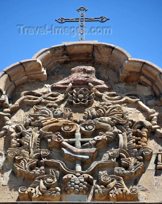 bolivia60: La Paz, Bolivia: Franciscan Order coat of arms on the façade of San Francisco church - cross with two arms crossing each other, one arm is that of Jesus Christ, the other is of St. Francis of Assisi - Orders of Friars Minor - photo by M.Torres - (c) Travel-Images.com - Stock Photography agency - Image Bank