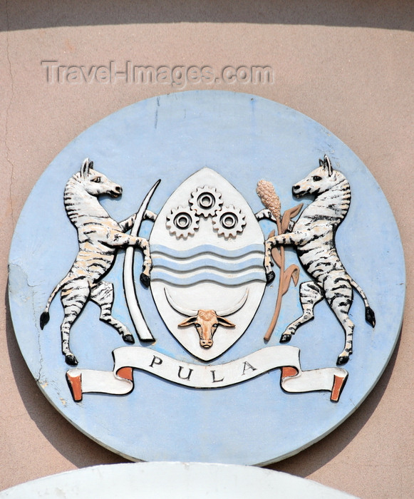 botswana43: Gaborone, South-East District, Botswana: Coat of arms of Botswana - shiled with cog wheels, waves and bull's head - zebras holding elephant's tusks - 'Pula' means rain - National Assembly of Botswana - Government Enclave - photo by M.Torres - (c) Travel-Images.com - Stock Photography agency - Image Bank