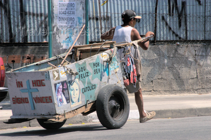 brazil129: Brazil / Brasil - São Paulo: religion and money - man with cart - Rio Pequeno avenue / religião e dinheiro - Avenida do Rio Pequeno - Zona Oeste (photo by M.Alves) - (c) Travel-Images.com - Stock Photography agency - Image Bank