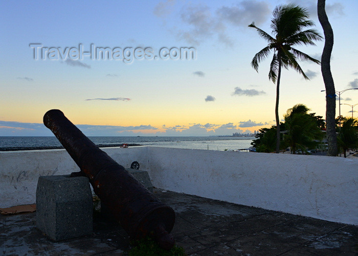 brazil162: Olinda, Pernambuco, Brazil: Fort of St Francis at sunset - cannon aimed at the ocean - 17th century Portuguese fortress built by Cristóvão Álvares - Recife in the distance - Fortim square - Forte de São Francisco (Fortim do Queijo) - photo by M.Torres - (c) Travel-Images.com - Stock Photography agency - Image Bank