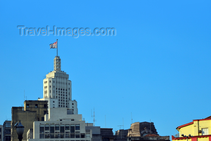 brazil465: São Paulo, Brazil: Altino Arantes Building with the flag of São Paulo state - aka Banespa Building - designed by Plínio Botelho do Amaral - in 1948, it was considered to be the biggest reinforced concrete structure in the world - photo by M.Torres - (c) Travel-Images.com - Stock Photography agency - Image Bank