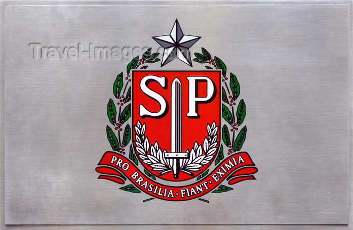 brazil480: São Paulo, Brazil: coat of arms of the State of São Paulo - steel plate outside a government building - sword on a red field with laurels and oak branchs and the initials SP, framed by a white star and two coffee plant branches - Latin motto 'Pro Brasilia fiant eximia' - photo by M.Torres - (c) Travel-Images.com - Stock Photography agency - Image Bank