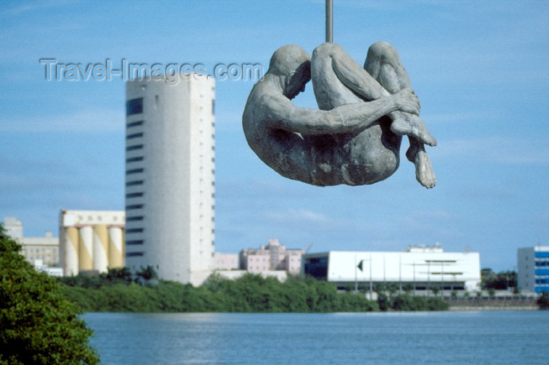 brazil97: Brazil / Brasil - Recife / REC (Pernambuco): monument to the victims of torture, looks like an acrobat - statue - art - view of Recife island from Rua da Aurora - Djaci Falcão building / Monumento Tortura Nunca Mais - edifíco Djaci Falcão - photo by Francisca Rigaud - (c) Travel-Images.com - Stock Photography agency - Image Bank