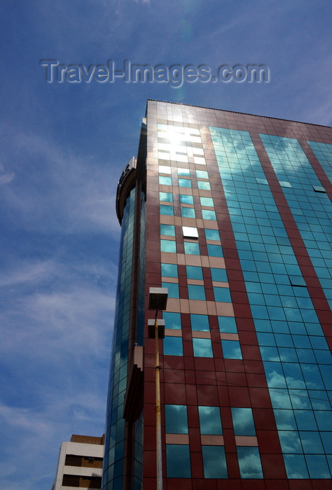 brunei41: Bandar Seri Begawan, Brunei Darussalam: Islamic Bank of Brunei Berhad (IBB) tower - stone and glass façade reflecting the sun - Dar Takaful IBB Utama, Pemancha street - photo by M.Torres - (c) Travel-Images.com - Stock Photography agency - Image Bank