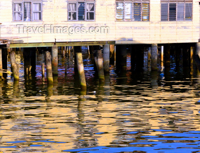 brunei99: Bandar Seri Begawan, Brunei Darussalam: buidings reflected on the water at Kampong Saba water village - photo by M.Torres - (c) Travel-Images.com - Stock Photography agency - Image Bank