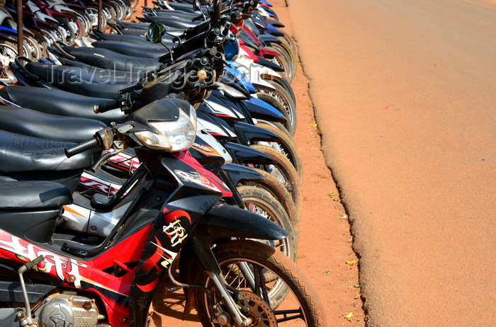 burkina-faso32: Ouagadougou, Burkina Faso: parked motorbikes and asphalt covered in red dust - photo by M.Torres - (c) Travel-Images.com - Stock Photography agency - Image Bank