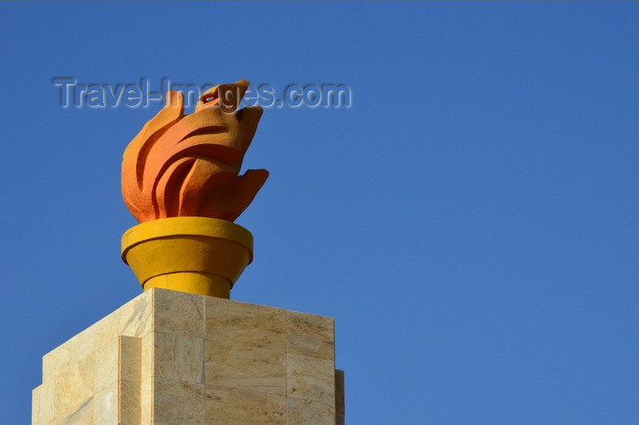 burkina-faso53: Ouagadougou, Burkina Faso: obelisk with flame at Place de la Revolution / Revolution square - communist aesthetics - aka Place de la Nation - photo by M.Torres - (c) Travel-Images.com - Stock Photography agency - Image Bank