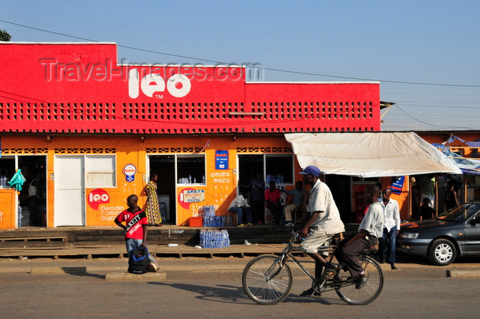 burundi6: Bujumbura, Burundi: street scene - bicycle and shop sponsored by the mobile phone network Leo - photo by M.Torres - (c) Travel-Images.com - Stock Photography agency - Image Bank