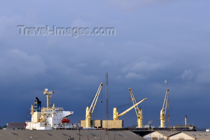 cameroon88: Cameroon, Douala: harbor scene - freighter ship and port warehouses - Douala harbor handles most of the country's imports and exports - Cosco Singapore - photo by M.Torres - (c) Travel-Images.com - Stock Photography agency - Image Bank