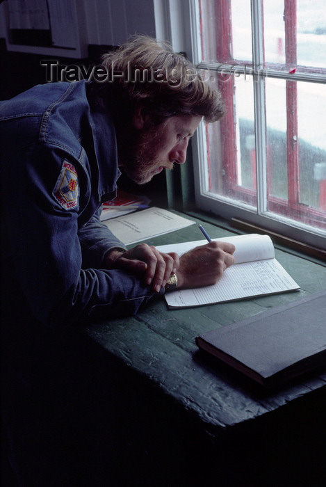 canada17: Campobello Island, New Brunswick, Canada: lighthouse keeper of East Quoddy Head Lighthouse updating log book - photo by C.Lovell - (c) Travel-Images.com - Stock Photography agency - Image Bank