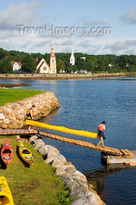 canada349: Kayaks and kayakers in the forground and the hisitoric three churches of Mahone Bay, Nova Scotia, Canada in the background - photo by D.Smith - (c) Travel-Images.com - Stock Photography agency - Image Bank