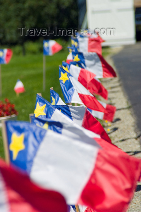 canada355: Scenic view Acadian flags during the 400th anniversary of the landing of the French in North America in Acadian region near Pubnico in western Nova Scotia, Canada - photo by D.Smith - (c) Travel-Images.com - Stock Photography agency - Image Bank