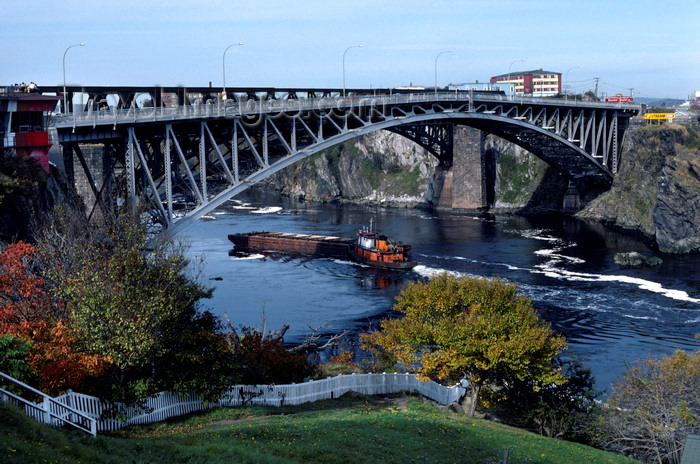 canada369: New Brunswick, Canada: tugboat pushing barge down the St. Lawrence - arch bridge - photo by C.Lovell - (c) Travel-Images.com - Stock Photography agency - Image Bank