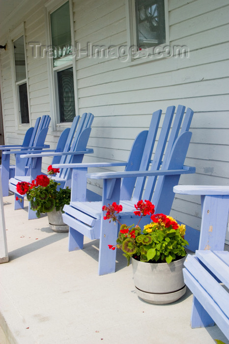 canada421: Victoria house showing porch and purple chairs in Acadian region of Nova Scotia, Canada - photo by D.Smith - (c) Travel-Images.com - Stock Photography agency - Image Bank