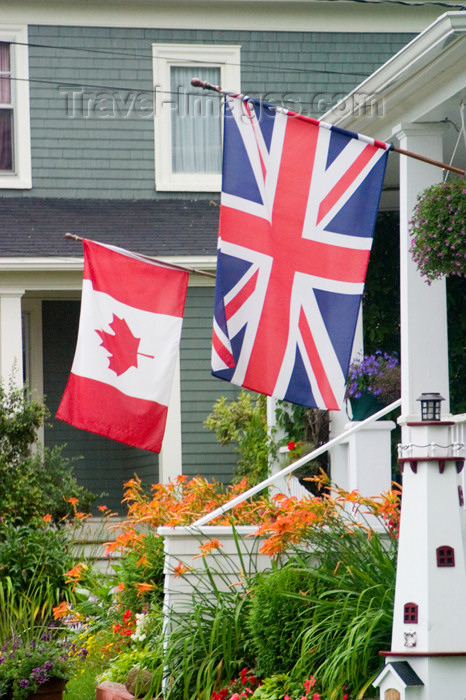 canada455: Close-up view of a Canadian and America flag at a home in historic Mahone Bay, Nova Scotia, Canada - photo by D.Smith - (c) Travel-Images.com - Stock Photography agency - Image Bank