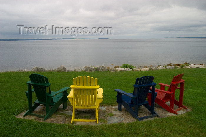 canada458: Close-up of 4 colourful Aderondack chairs and a view of the Atlantic Ocean from a garden located between Chester and Hubbards, Nova Scotia, Canada - photo by D.Smith - (c) Travel-Images.com - Stock Photography agency - Image Bank