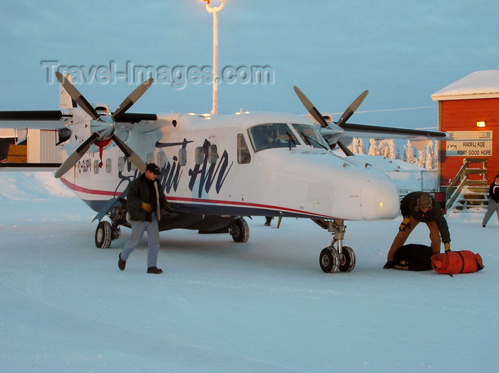 canada525: Fort Good Hope, Northwest Territories, Canada: preparing a Dornier 228 in cold weather - photo by Air West Coast - (c) Travel-Images.com - Stock Photography agency - Image Bank