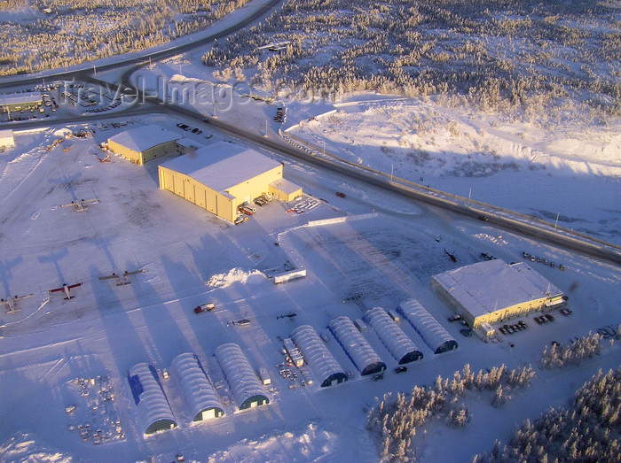 canada527: Northwest Territories, Canada: frozen aerodrome and hangars seen from the air - long shadows - photo by Air West Coast - (c) Travel-Images.com - Stock Photography agency - Image Bank