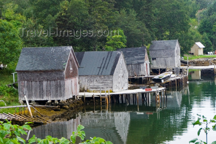 canada55: Old wooden house on stilts at low tide near Peggy's Cove, Nova Scotia, Canada - photo by D.Smith - (c) Travel-Images.com - Stock Photography agency - Image Bank