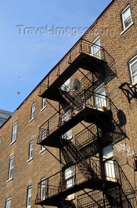 canada569: Montreal, Quebec, Canada: emergency stairs - fire escape - escaliers de secours - Rue Saint-Denis - photo by M.Torres - (c) Travel-Images.com - Stock Photography agency - Image Bank