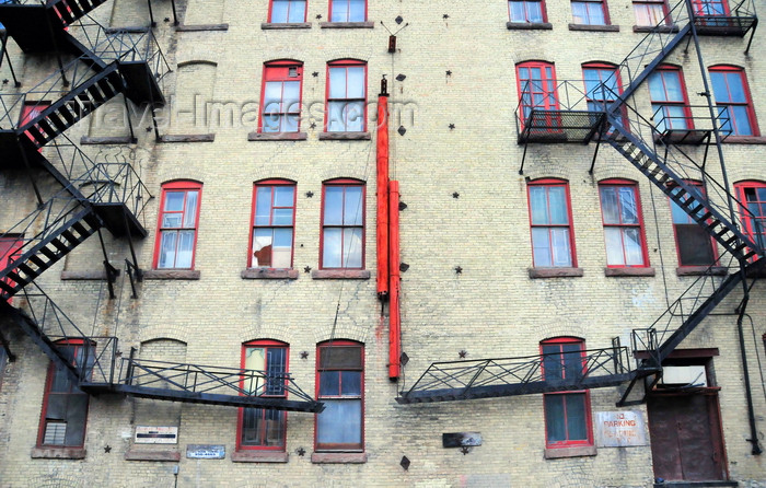 canada755: Winnipeg, Manitoba, Canada: emergency stairs - rear façade of a brick building in the Exchange District - photo by M.Torres - (c) Travel-Images.com - Stock Photography agency - Image Bank