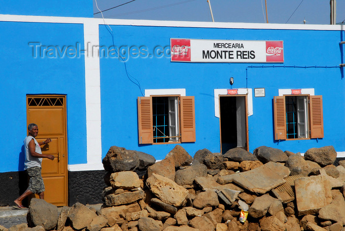 capeverde37: Palmeira, Sal island / Ilha do Sal - Cape Verde / Cabo Verde: boulders and the blue façade of 'Monte Reis' grocery shop - mercearia - photo by E.Petitalot - (c) Travel-Images.com - Stock Photography agency - Image Bank