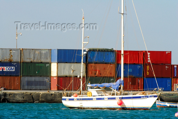 capeverde47: Palmeira, Sal island / Ilha do Sal - Cape Verde / Cabo Verde: sailing boat 'Lovely Bimba' and containers in the harbour - photo by E.Petitalot - (c) Travel-Images.com - Stock Photography agency - Image Bank