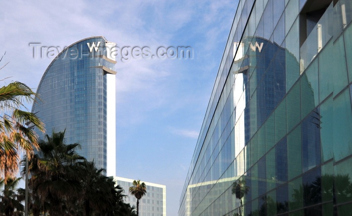 catalon165: Barcelona, Catalonia: W Barcelona hotel and its reflection on a curtain wall, architect Ricardo Bofill - photo by M.Torres - (c) Travel-Images.com - Stock Photography agency - Image Bank