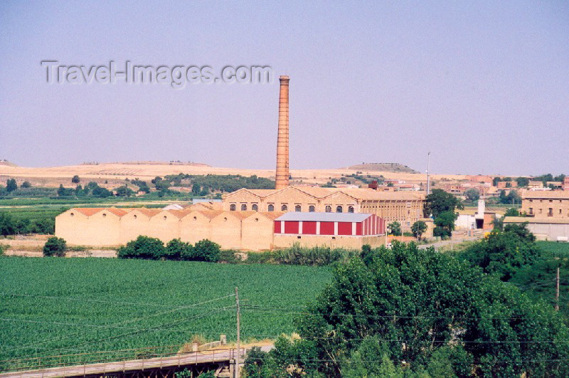 catalon17: Catalonia / Catalunya - Térmens, Noguera, Lleida province: factory amongst the orchards - photo by Miguel Torres - (c) Travel-Images.com - Stock Photography agency - Image Bank