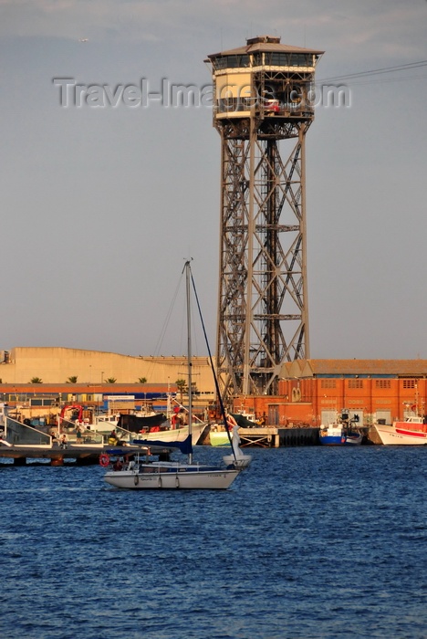 catalon257: Barcelona, Catalonia: sailing by the Torre de Sant Sebastià (1931), Port Vell Aerial Tramway - architect Carles Buïgas - Barceloneta - photo by M.Torres - (c) Travel-Images.com - Stock Photography agency - Image Bank