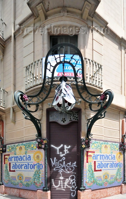 catalon270: Barcelona, Catalonia: art nouveau lamp and tiles - Farmacia Laboratorio, corner of Carrer del Bruc and Ronda de Sant Pere - photo by M.Torres - (c) Travel-Images.com - Stock Photography agency - Image Bank