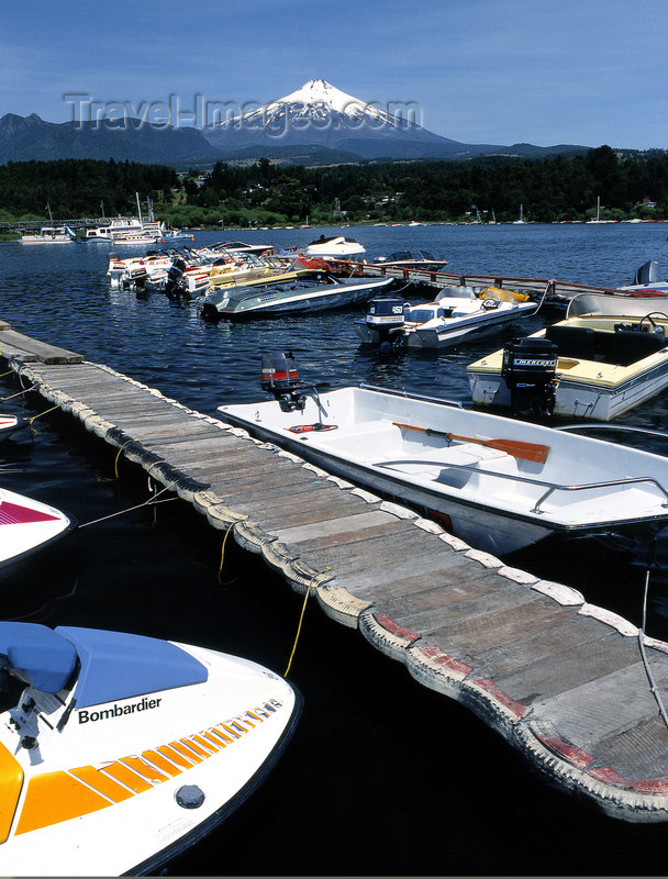 chile100: Araucanía Region, Chile - Pucón: Lake Villarica - boats in the marina and view of Villarica volcano - photo by Y.Baby - (c) Travel-Images.com - Stock Photography agency - Image Bank