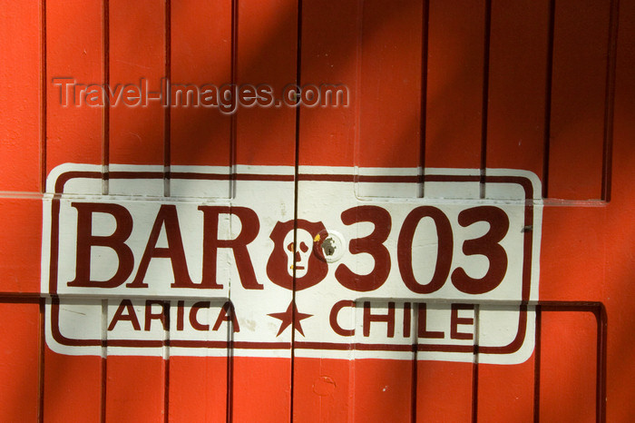 chile111: Chile - Arica: bar door painted as car license place - puerta de un bar - photo by D.Smith - (c) Travel-Images.com - Stock Photography agency - Image Bank