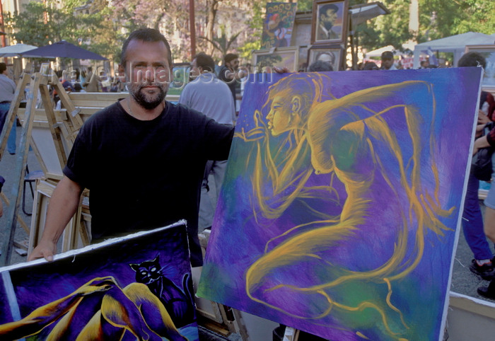 chile142: Santiago de Chile: artists display their painting in the Plaza de Armas - photo by C.Lovell - (c) Travel-Images.com - Stock Photography agency - Image Bank