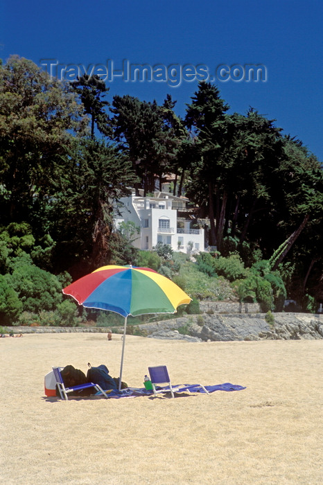 chile184: Zapallar, Valparaíso region, Chile: the coastal play ground of wealthy Chileans has a beautiful beach and exclusive homes - parasol - photo by C.Lovell - (c) Travel-Images.com - Stock Photography agency - Image Bank