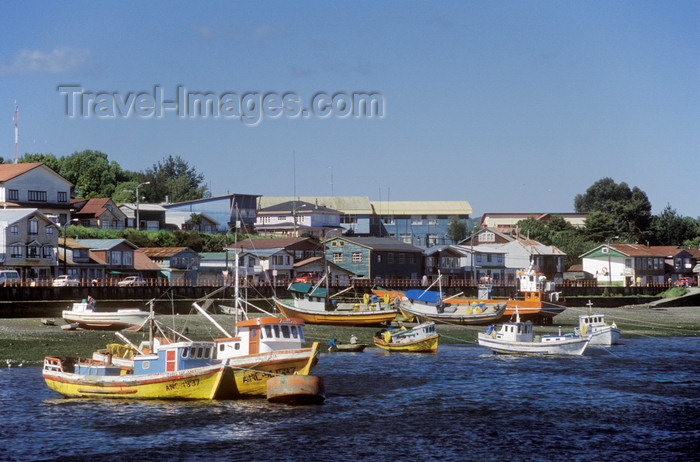 chile190: Quellón, Chiloé island, Los Lagos Region, Chile: the fishing village seen from the Navimag Ferry Alejandrina on arrival from Chaitén to Chiloe Island – fishing boats and waterfront houses – Costanera Pedro Montt – Canal Yelcho - photo by C.Lovell - (c) Travel-Images.com - Stock Photography agency - Image Bank