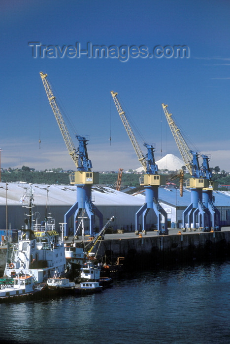 chile209: Puerto Montt, Llanquihue Province, Los Lagos Region, Chile: the port with industrial ship cranes and tug boats - Reloncaví Sound - photo by C.Lovell - (c) Travel-Images.com - Stock Photography agency - Image Bank