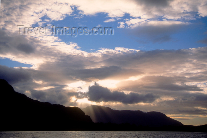 chile217: Aisén region, Chile: clouds and rays of light - temperate rain forest of northern Patagonia and the Pacific Ocean - photo by C.Lovell - (c) Travel-Images.com - Stock Photography agency - Image Bank