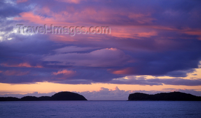 chile220: Aisén region, Chile: island silhouettes and the Pacific Ocean at sunset- photo by C.Lovell - (c) Travel-Images.com - Stock Photography agency - Image Bank
