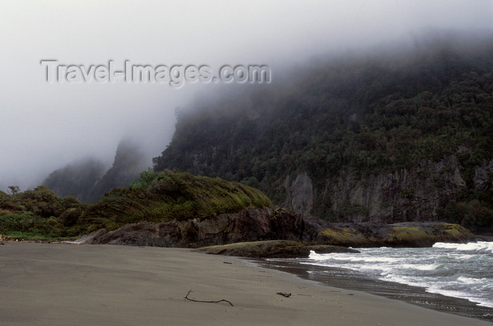 chile221: Aisén region, Chile: mist on playa Toninas (Dolphin beach), west of La Junta – green hills covered in the temperate rain forest of northern Patagonia - photo by C.Lovell - (c) Travel-Images.com - Stock Photography agency - Image Bank