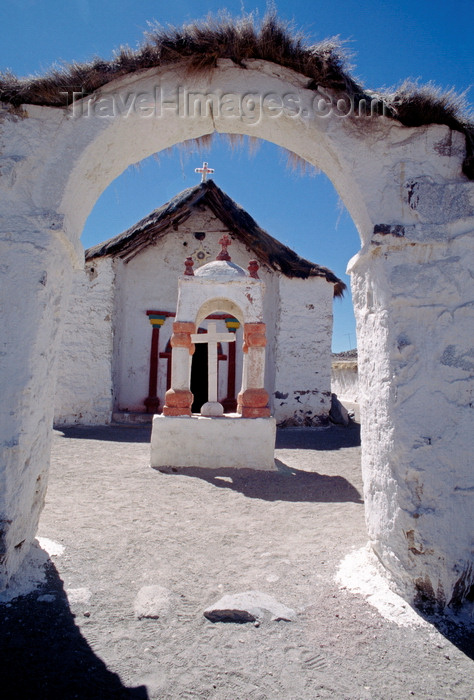 chile241: Lauca National Park, Arica and Parinacota region, Chile: beautiful 17th century adobe church in the village of Parinacota - whitewashed entrance arch - Norte Grande - photo by C.Lovell - (c) Travel-Images.com - Stock Photography agency - Image Bank